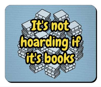 its not hoarding if its books piles of books blue stickers, magnet
